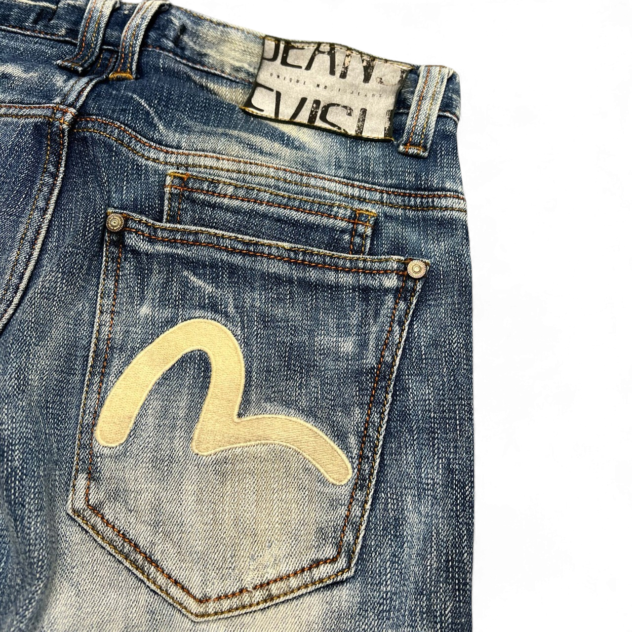 TWC Vintage Evisu Damen Jeans in Blau mit charakteristischem beigem Seagull-Logo auf der Gesäßtasche
