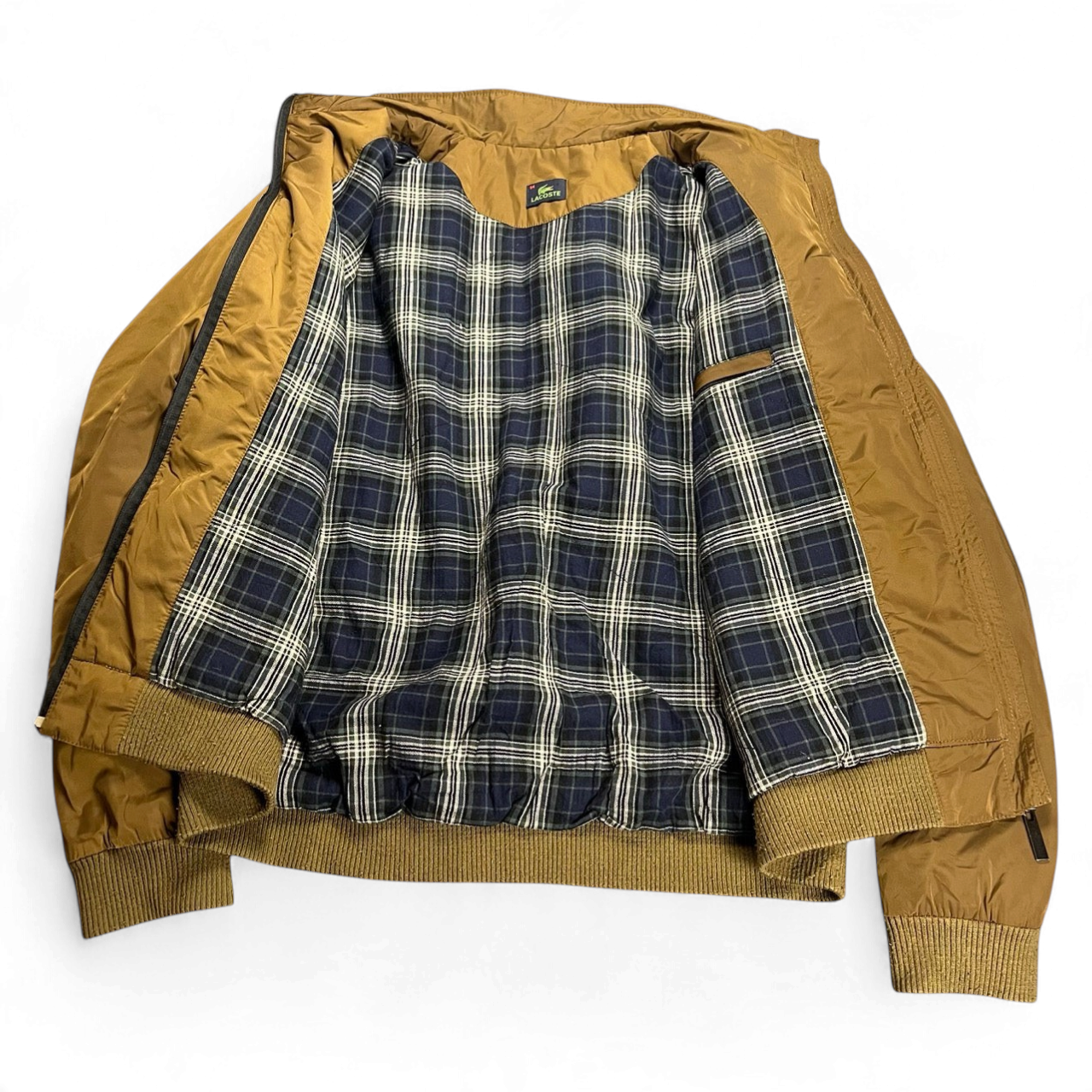 TWC Vintage Lacoste Jacke in Braun mit kariertem Innenfutter und gerippten Bündchen im Vintage-Stil