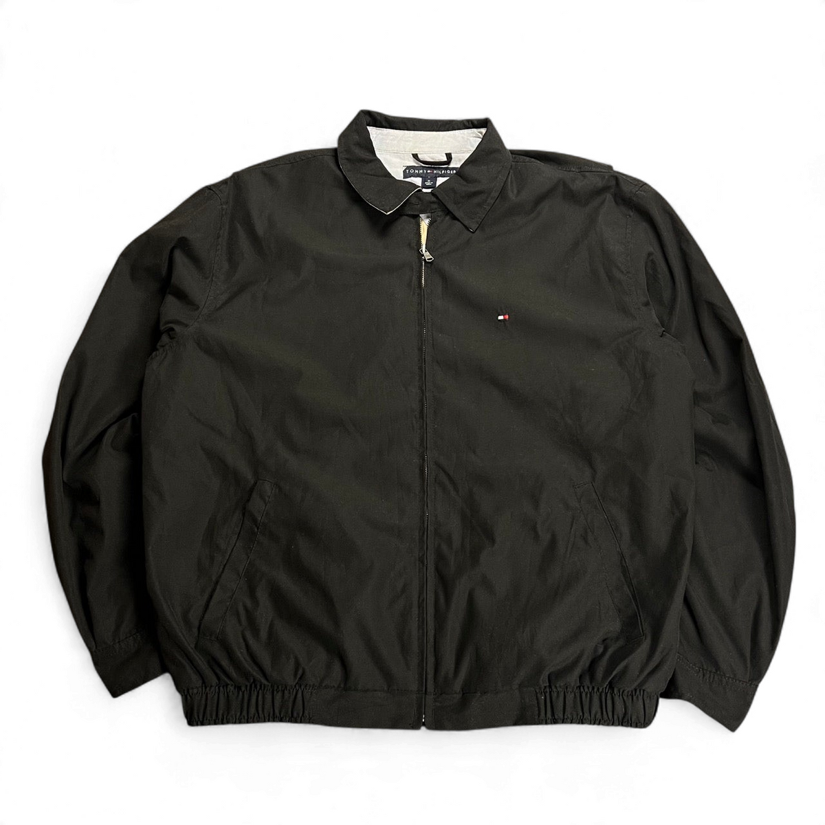 Schwarze TWC Vintage Tommy Hilfiger Harrington Jacke mit Reißverschluss und kleinem Logo-Stick auf der Brust